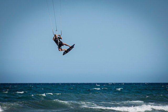 A kiteboarder catching huge air